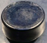 Plutonium-gallium alloy ingot reclaimed from a weapon pit.