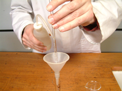 The glass rod is rinsed down